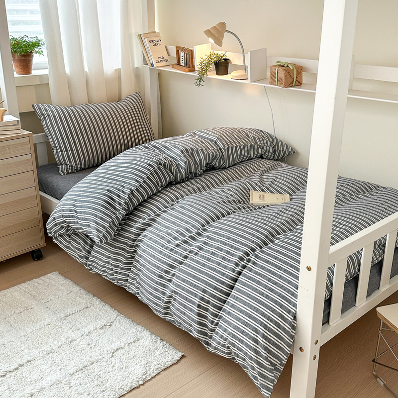 Tejido y lavado con agua Xinjiang algodón estudiantes tres piezas colchón sin aire impreso algodón dormitorio estudiantes piezas necesarias