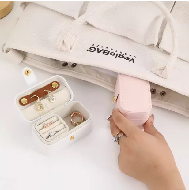 Grenzüberschreitender Amazon-Daumenfinger-Schmuckschatulle mit Magnet für Reisen, tragbar, Hochzeitsring, Ohrstecker, kleine Schmuckschatulle