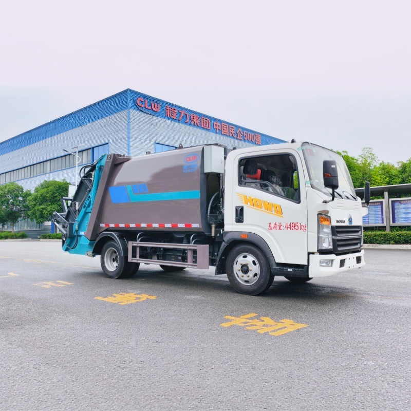 Howo pure electric rear-mounted compressed garbage truck with independent sewage collection for municipal solid waste compaction and removal