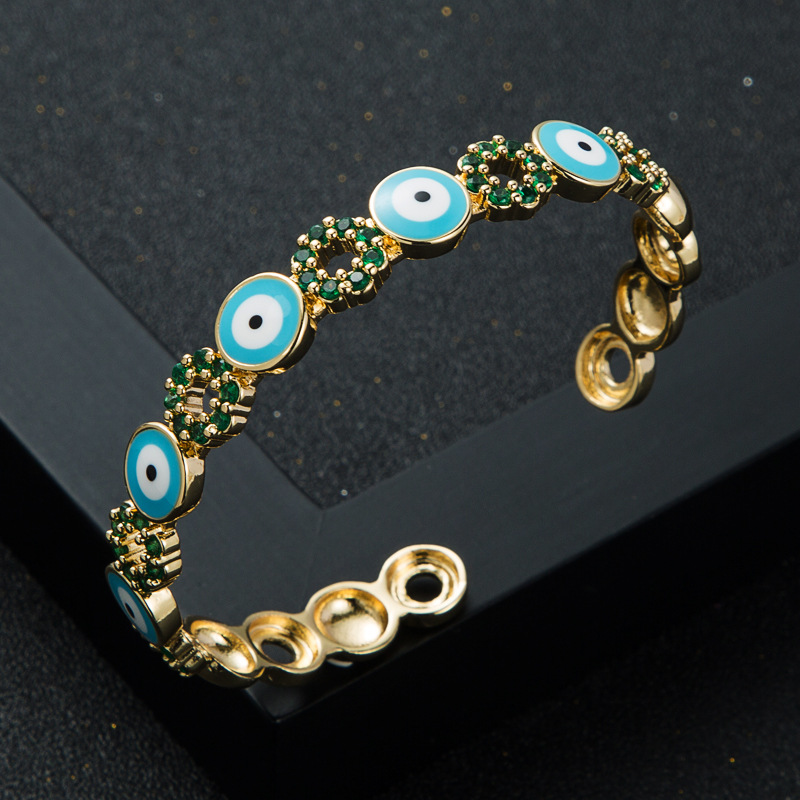 Fashion Copper Gold-plated Micro-set Zircon Drip Oil Round Devil's Eye Opening Bracelet display picture 5