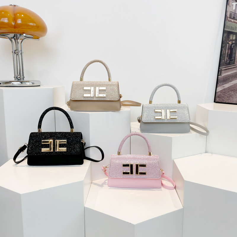 2025 primavera nueva bolsa cuadrada de moda temperamento simple estilo extranjero portátil bolsa de viaje