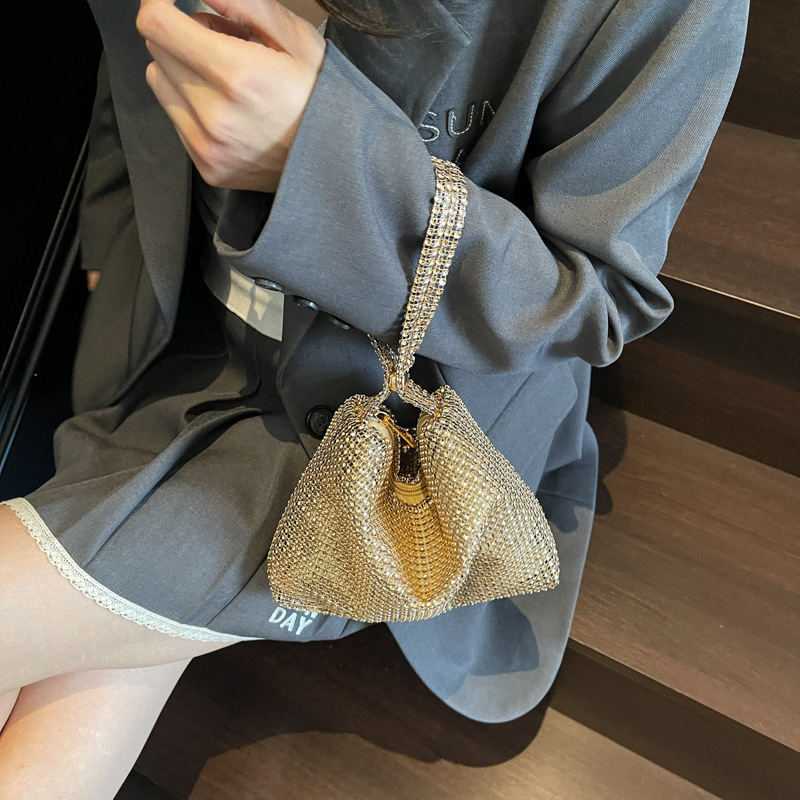 Bolsos pequeños de moda coreana 2025 verano nuevo estilo bolso femenino bolso de lentejuelas estilo occidental bolso de lona simple de alta calidad