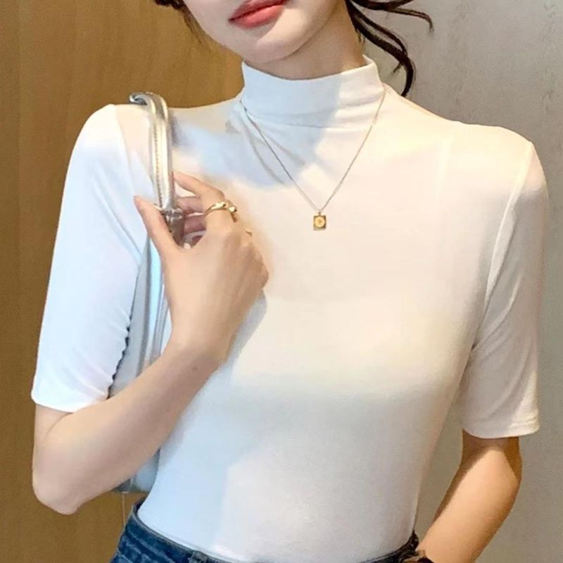 秋冬の小さい立襟の半袖のtシャツの女性の早秋の新型の韓国版は半高襟の5分の袖の純色の上着を身につけます。|undefined