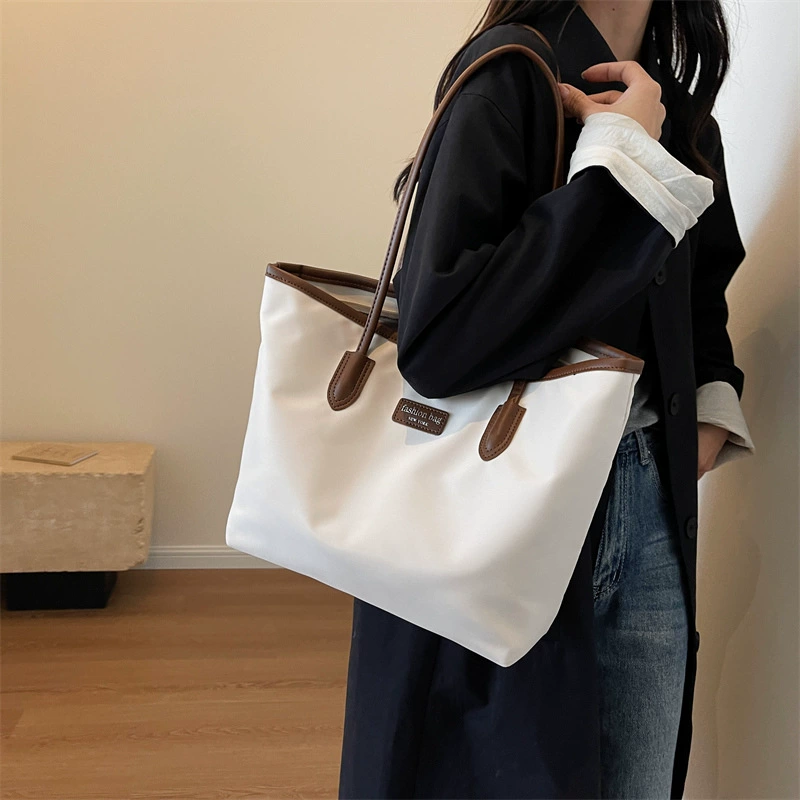 Трансграничная новая высококачественная женская сумка большой вместимости, универсальная пригородная сумка на плечо, водонепроницаемая простая сумка-тоут, товары с фабрики, оптовая продажа