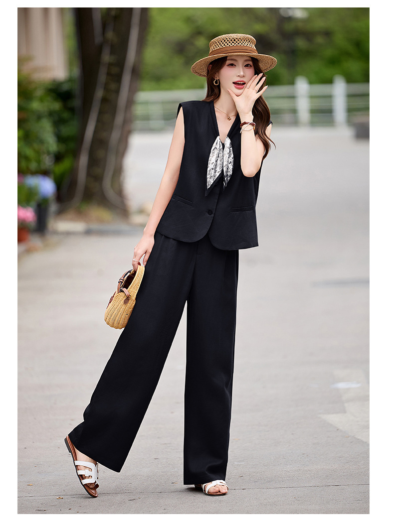 Bộ vest nữ gồm áo gile và quần tây ống đứng cạp cao — màu đen, màu cam, màu trắng ngà chi tiết 20