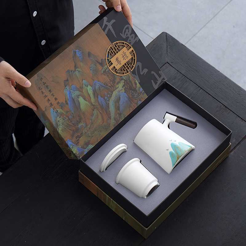 会社のビジネスセットの贈り物千里江山のノートパソコンの陶磁器のお茶の杯の贈り物のお土産は取引先にプレゼントします。|undefined
