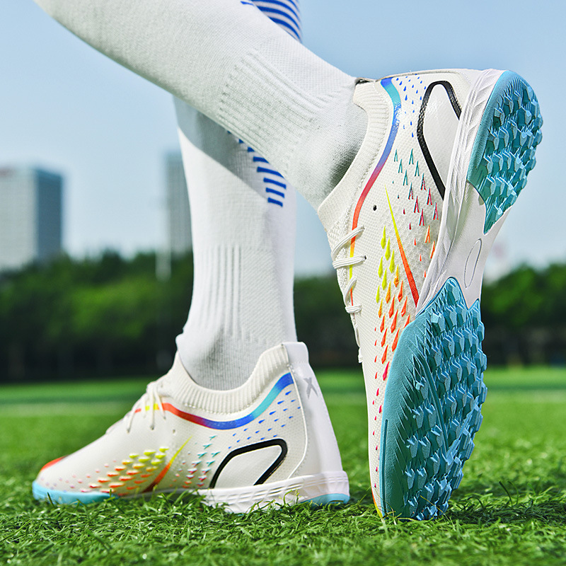 Cross-border Messi X10 Putian zapatos de fútbol hombres de corte bajo entrenamiento de juego de estudiantes AG tachuelas zapatillas de hierba