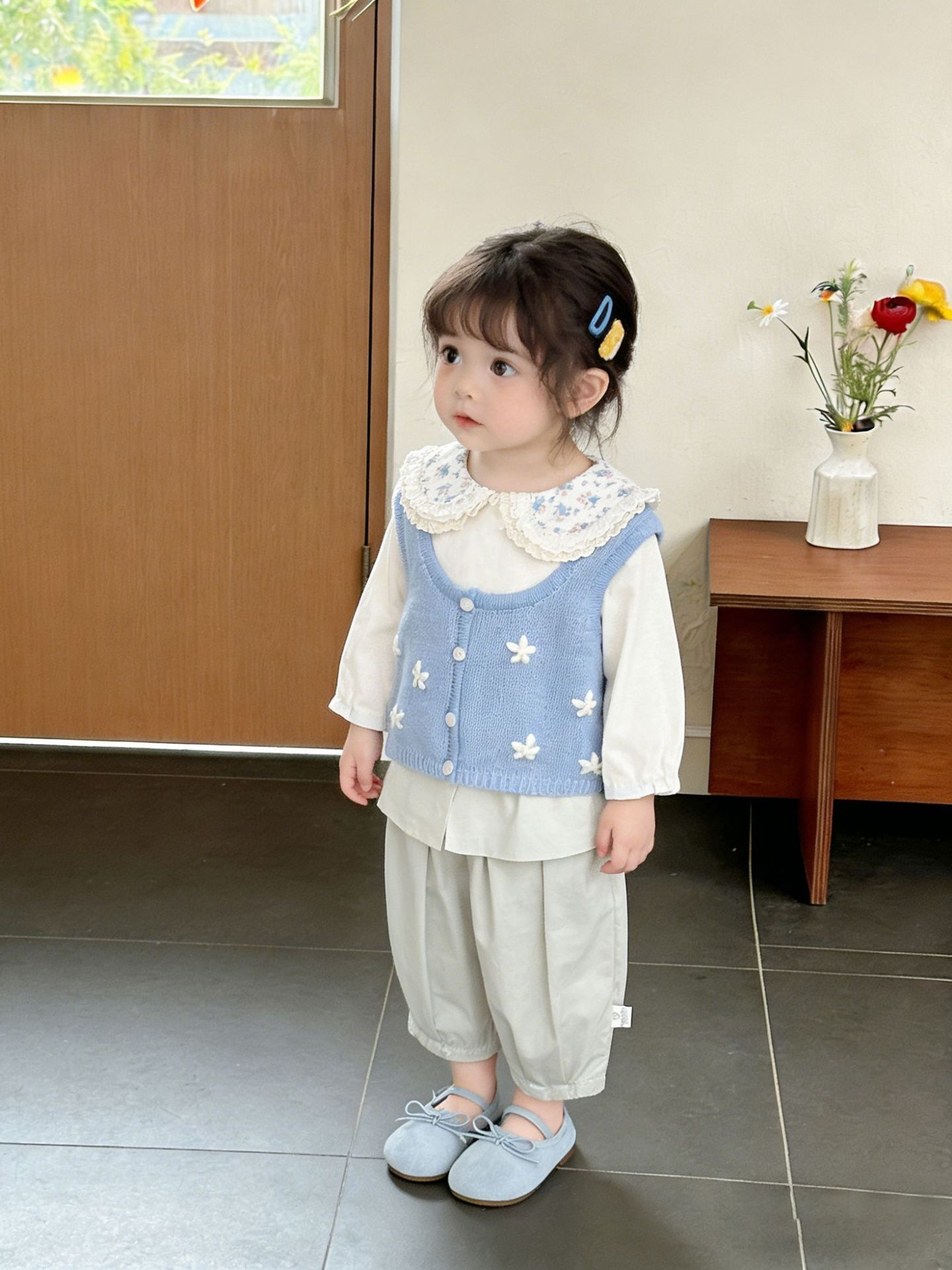 Ropa de primavera de niñas coreana dulce chaleco de punto de flor nueva ropa de bebé plegable con chaleco de vestir exterior