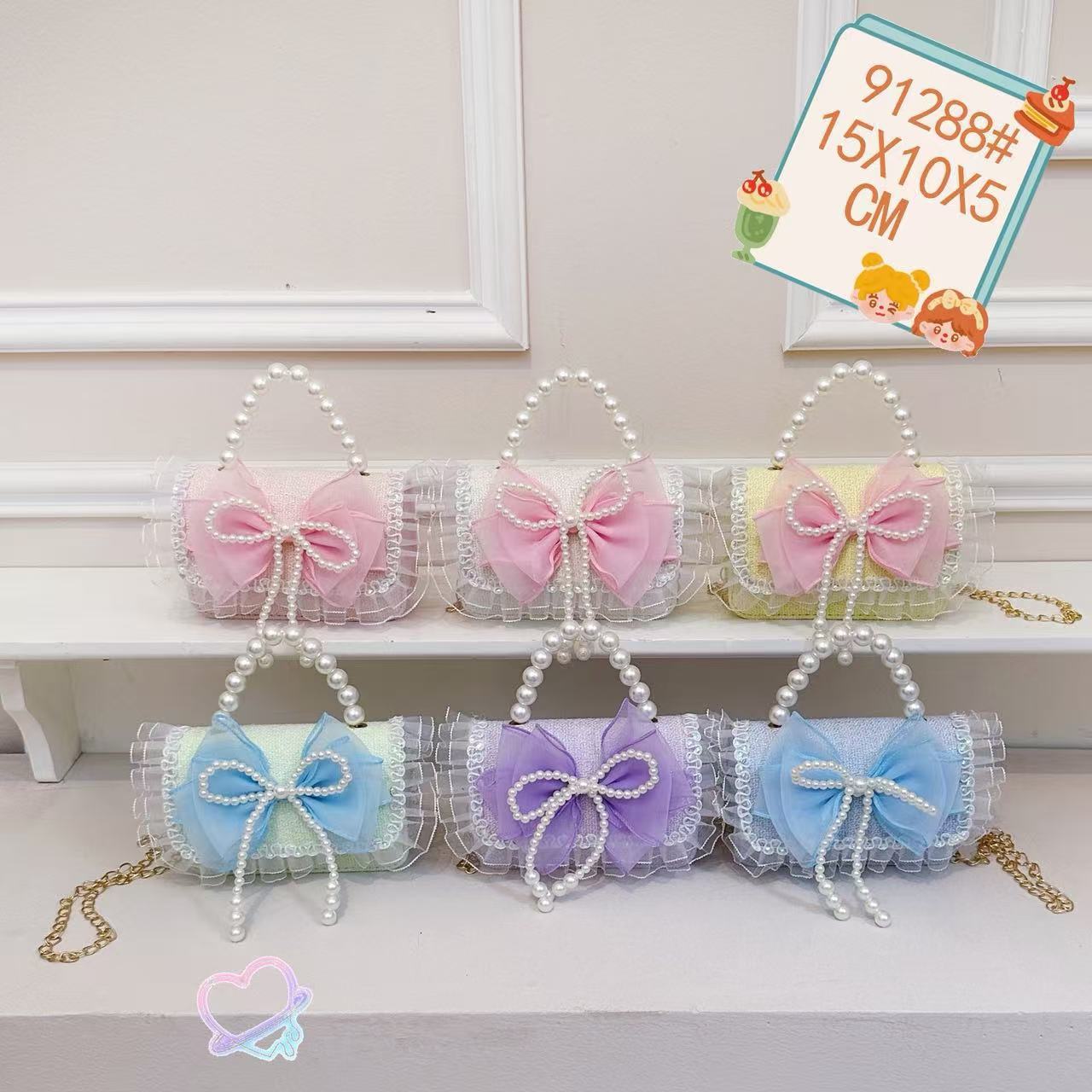 Nuevo comercio exterior pequeña fragancia niñas hombro mochila de moda perla arco bolsos de niños bolsos de cambio de dibujos animados