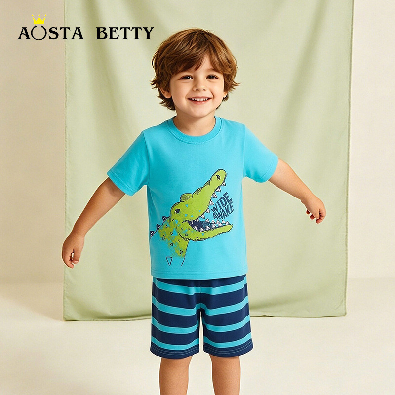 Suministro transfronterizo de ropa infantil europea y americana al por mayor, trajes de verano para niños, conjunto de dos piezas con estampado de cocodrilo de dibujos animados, cuello redondo y pantalones cortos.
