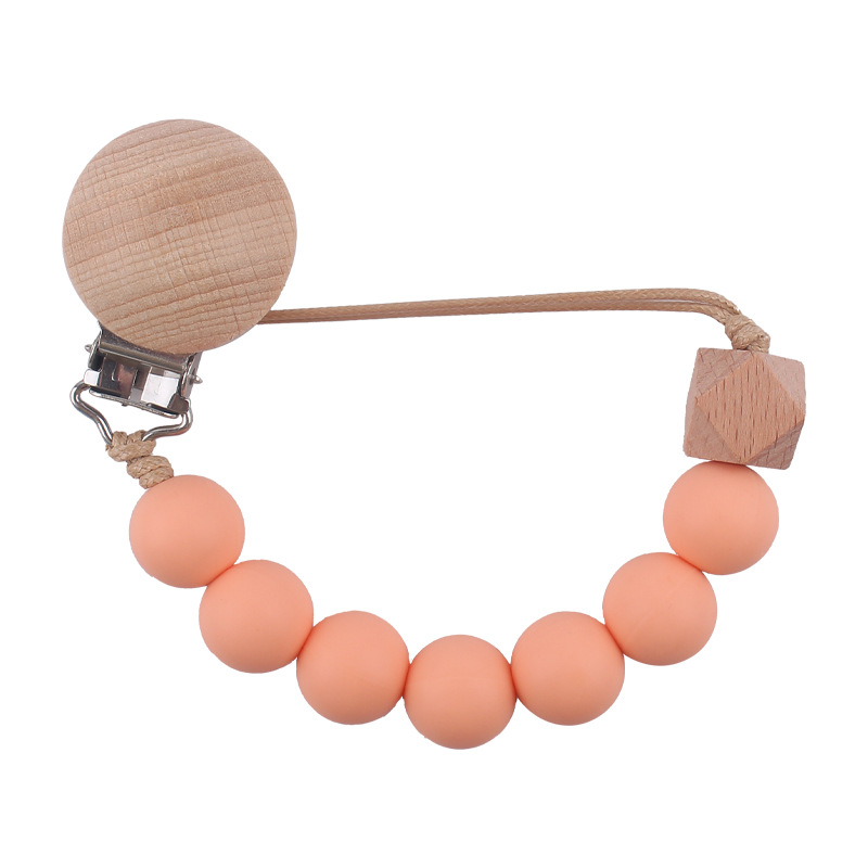 Nuevo bebé suministros de haya chupete clip calmante bebé mordedura de silicona molar madera octogonal chupete cadena anti-caída