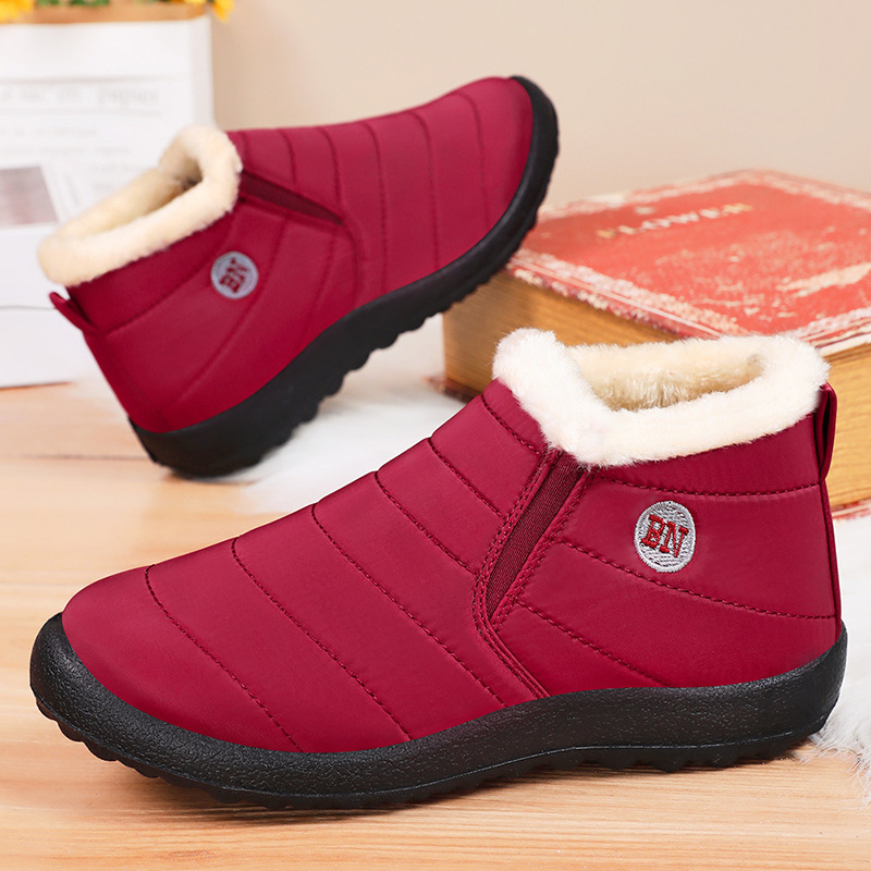 Zapatos de algodón de invierno nuevo poliuretano par de botas de algodón gruesas al aire libre calentamiento botas de nieve botas cortas de comercio exterior