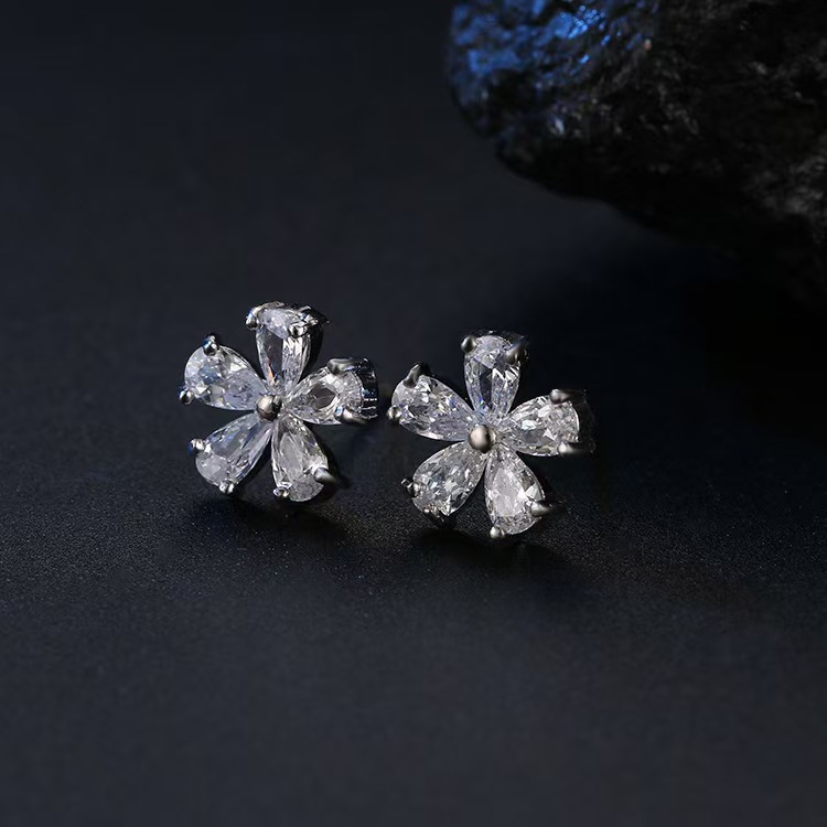 Nuevos pendientes de flores de zircon de alta calidad, pendientes de vacaciones ligeros de lujo, pendientes de pétalos de flores al por mayor.
