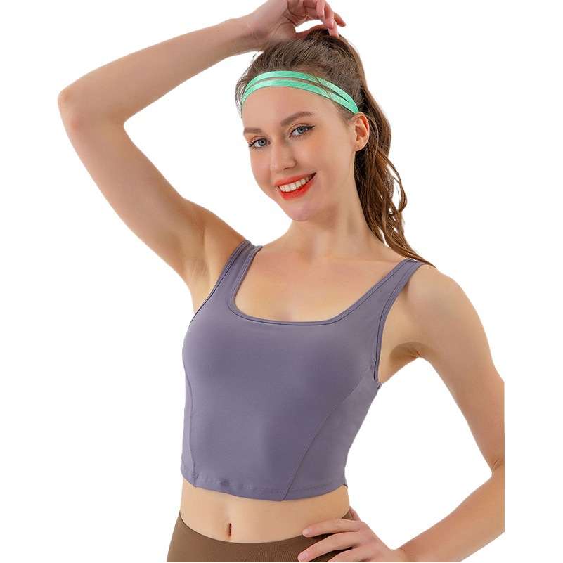 Ropa interior deportiva ropa exterior de mujer fitness top de longitud media camisola desnuda ropa de Yoga de secado rápido a prueba de golpes con almohadilla en el pecho