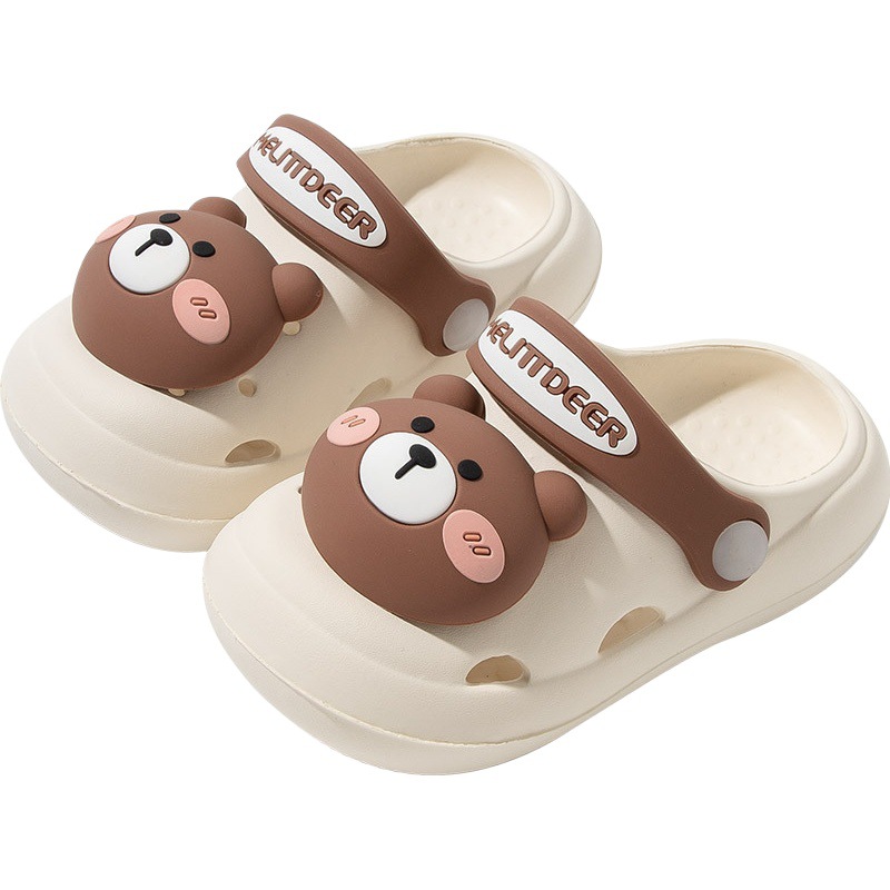 Zapatillas de los niños de dibujos animados al por mayor sensación de mierda bebé agujero cerrado zapatos suave cómodo ligero sandalias los niños