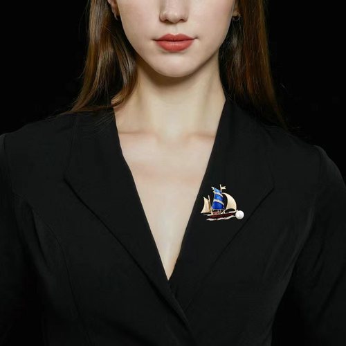 High-end temperament Korean-style brooch for women, featuring a oil ship sail design, with pearls and a stylish anti-slip fastener, elegant and fashionable.