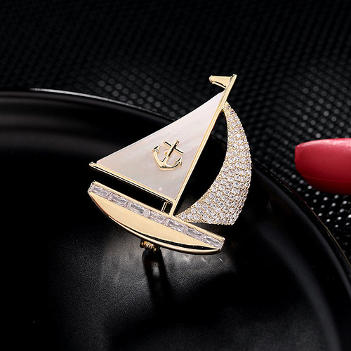 Korean style fashionable autumn and winter clothing accessories mother-of-pearl zircon inlaid high-end brooch Smooth sailing creative design sailing brooch