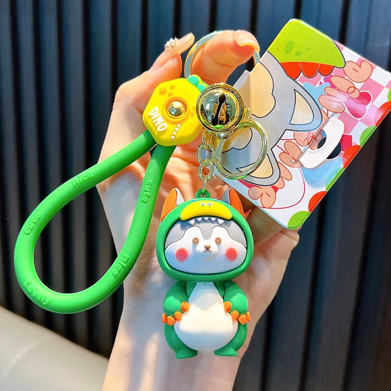 Keychain dinosaurio auténtico lindo bolso colgante de goma blanda llavero de automóvil muñeca pequeña máquina de regalos al por mayor image 28