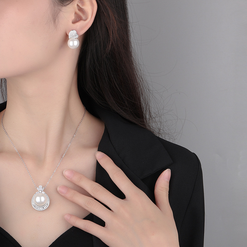Zhuang Sheng joyería nueva S925 plata con incrustaciones aobei madre Zhen moda de las mujeres europeas y americanas perlas blancas traje 16 mm14mm