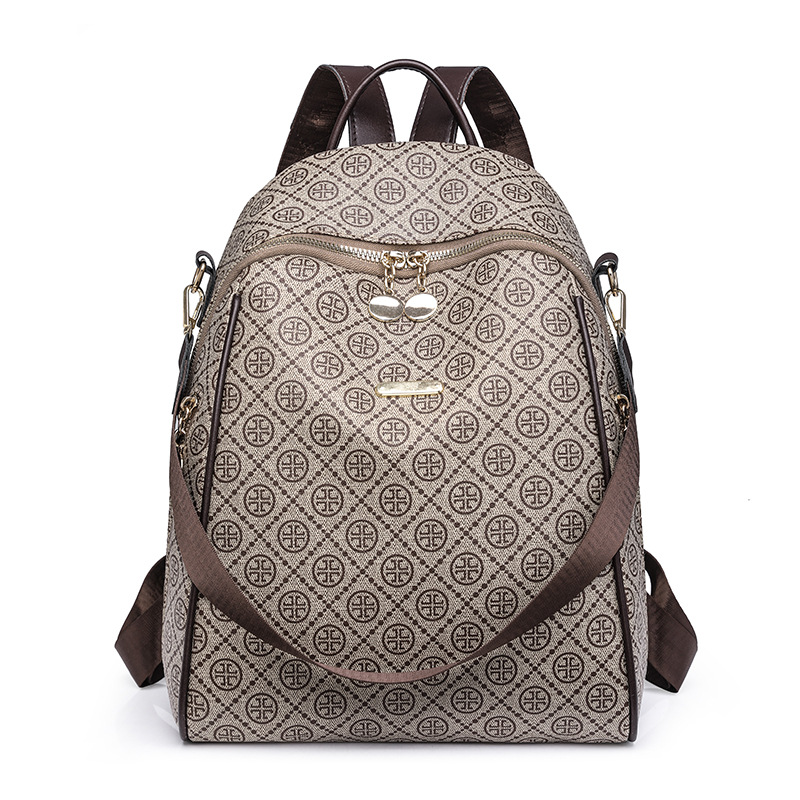 2024 nueva mochila de cuero suave casual para mujer, impresión de moda, color de contraste, mochila de viaje multifuncional de doble uso al por mayor