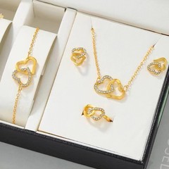 百組の新型永結同心ジュエリーセットのアイデアは、ダイヤモンドのネックレスをはめ込んだピアスの指輪の四つのセットです。