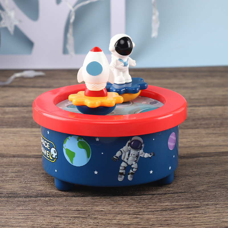 Base naval de dibujos animados amazonos niños caja de música pianos astronautas girando planetas explorando cajas de octeto