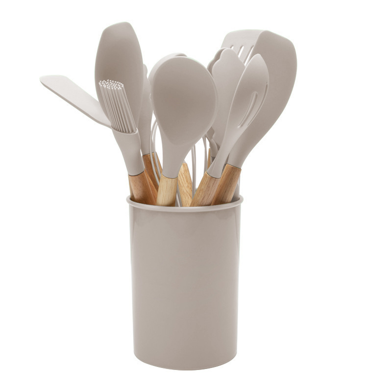 mango de madera personalizado set de cocina de silicona set de doce piezas antiadherente almacenar barril de silicona para uso diario