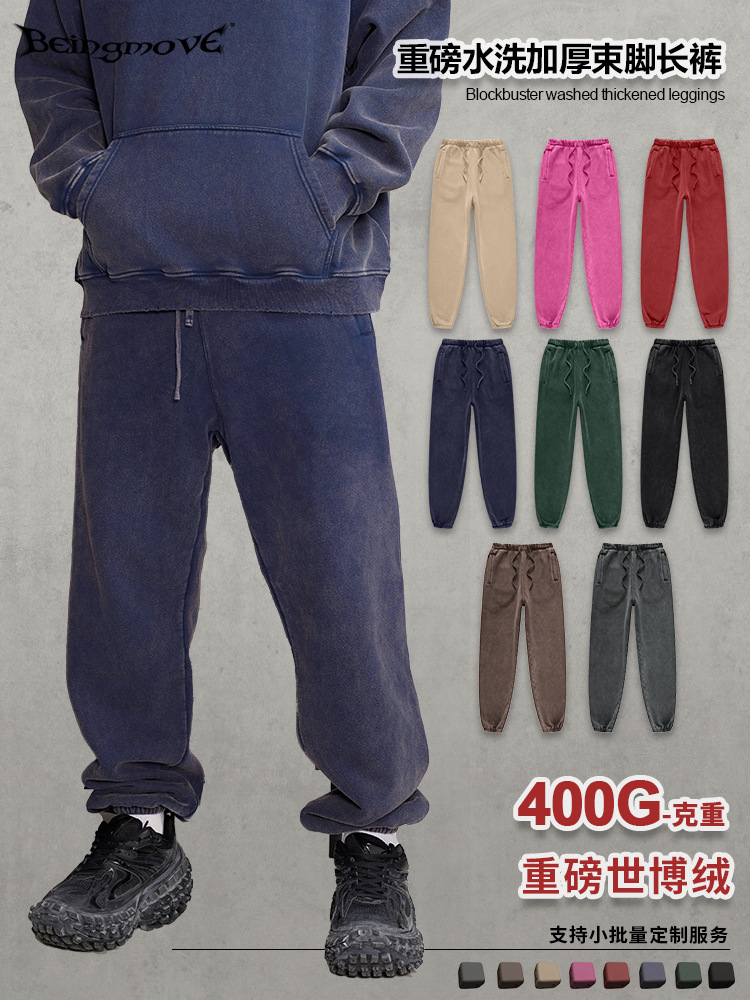 2025 otoño y invierno nuevos productos estadounidenses de peso viejo lavado con agua gruesa calentamiento frito flocos de nieve de tamaño grande abarrotamiento de pies pantalones de moda para hombres