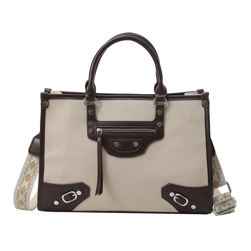 Bolsa de hombro retro remachado lujoso ligero versátil Volkswagen gran capacidad bolso de mano caliente locomotora cool mochila