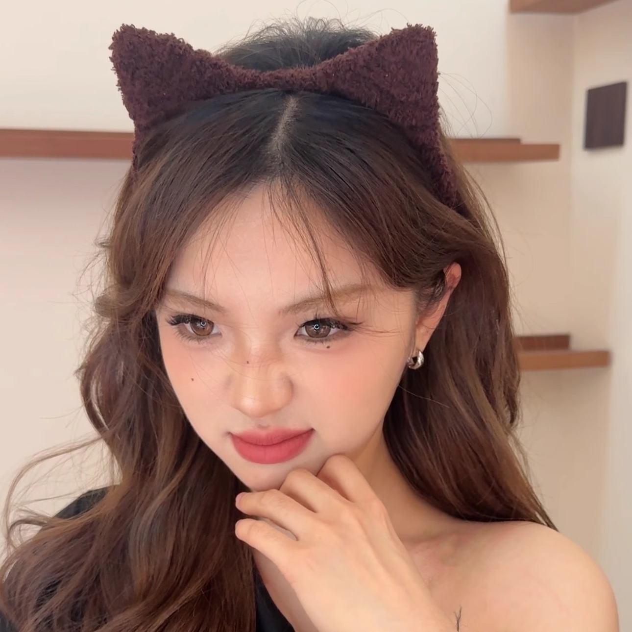 A brown cat ear headband