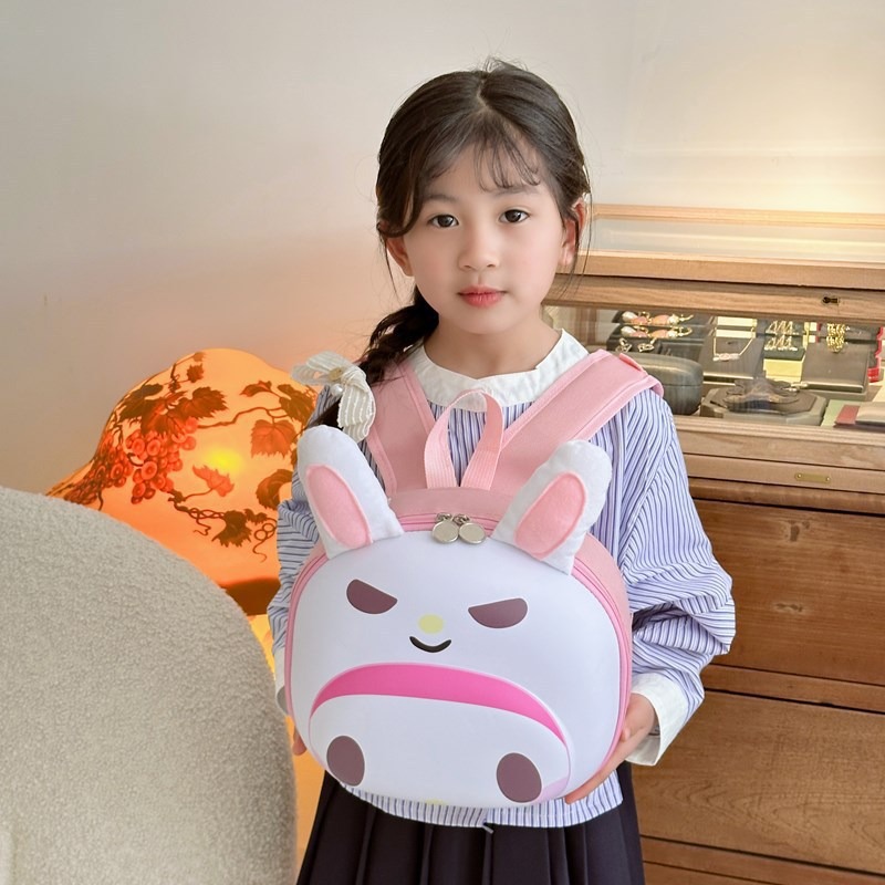 Transfronterizos niños mochila de cáscara dura jardín de infantes niños mochila de cáscara de huevo de dibujos animados EVA mochila tridimensional para niños y niñas
