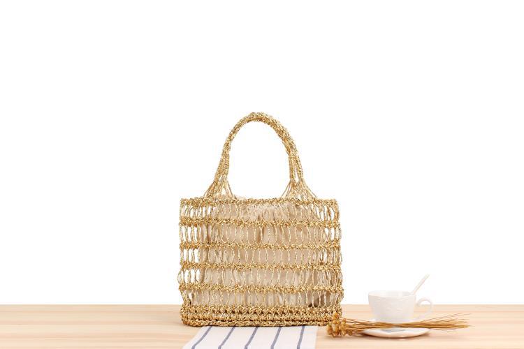 Women's Medium Plastic Paper Solid Color Beach Classic Style Weave Hollow String Beach Bag display picture 2