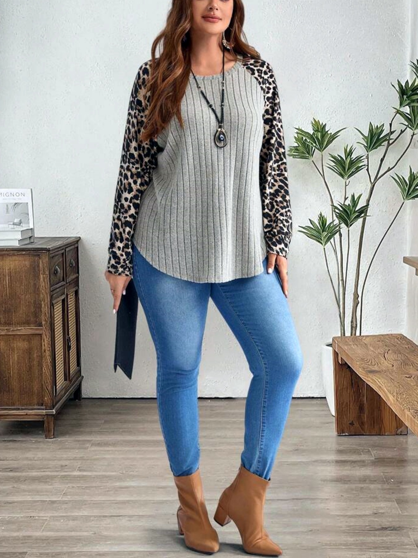 2024 otoño y invierno nuevo estilo de ropa de mujer europea y americana estación independiente Amazon venta caliente estampado leopardo clásico empalme agujero chaqueta de manga larga image 4