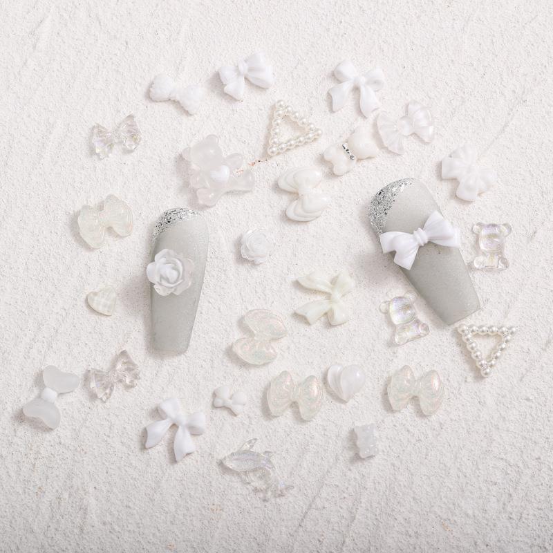 Cross-border nail Bow accesorios Diamond 100 mezcla de resina hecha a mano Rosa tridimensional negro blanco Aurora