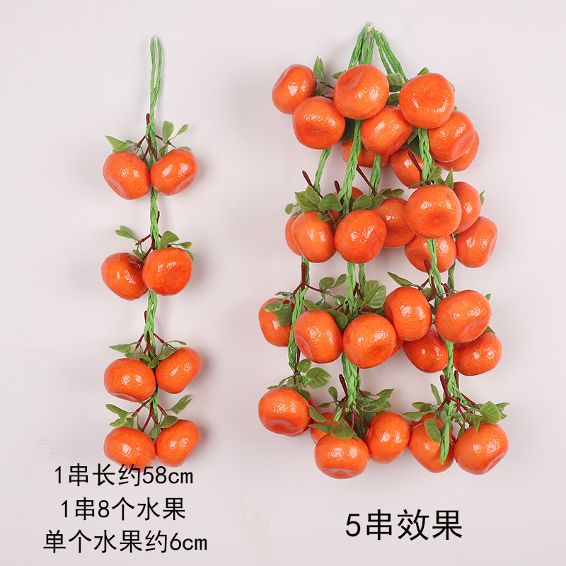 잎이 달린 오렌지 한 다발