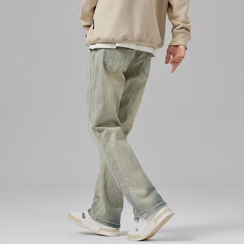 Vaqueros teñidos de barro amarillo de marca de moda retro para hombres lavados y viejos pantalones micro-lat de calle alta americana 2024