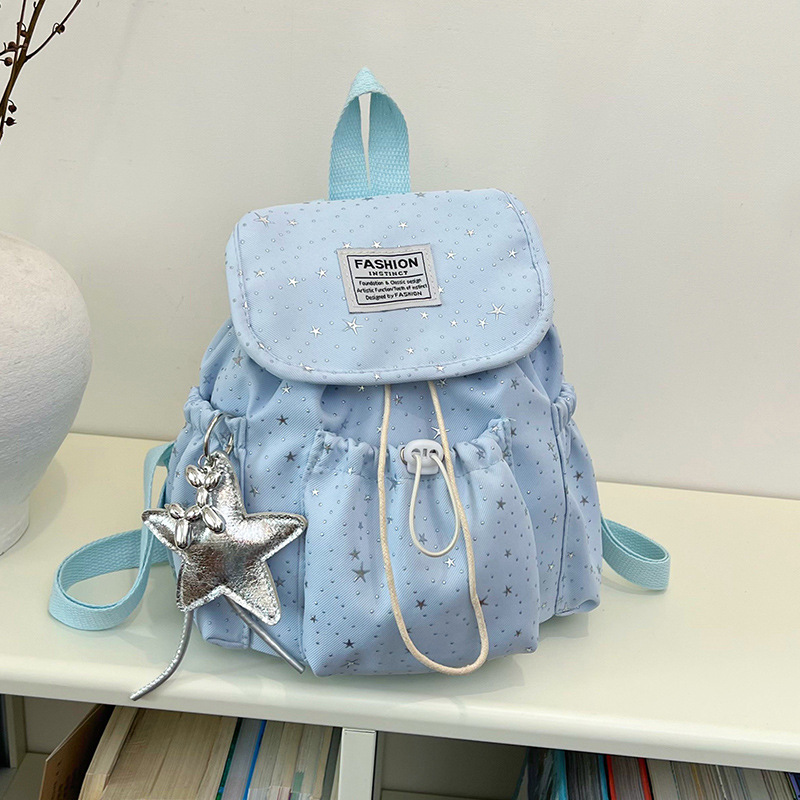 Primavera nuevo estilo ins leche de viento bonito joven estrella impresa mochila de hombro para mujeres de alto valor dulce mochila pequeña
