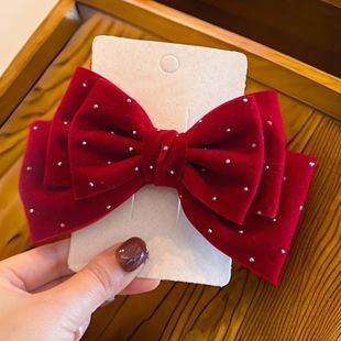 Cute demi-season hairgrip with bow