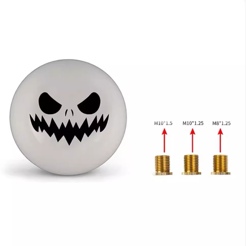 Car modification gear shift knob, manual transmission, round black and white ghost face design, resin gear stick head, universal shift lever
