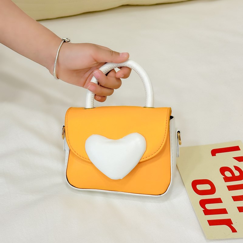 Bolsos para chicas coreanas de dibujos animados de amor contra colores de moda extranjera para niños de un solo hombro bolso de cambio