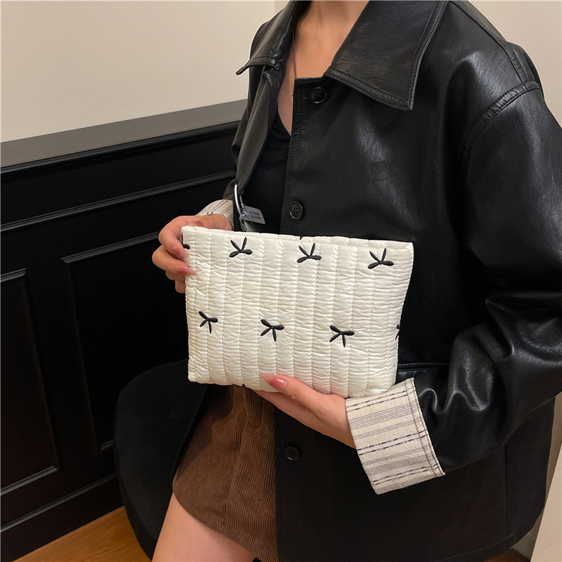 2025 invierno nueva moda portátil bolso de mano mecha de moda impresión mariposa de maquillaje de gran capacidad bolso de mano