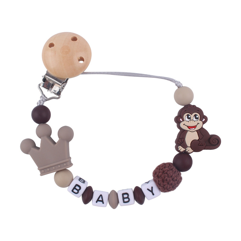 Nuevo bebé suministros de dibujos animados animal mono mordedor creativo bebé DIY mordedura molar Cadena de pezón cadena anti-caída