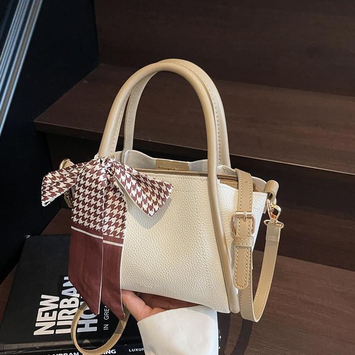 Bolso de cesta de verduras portátil de estilo explosivo de comercio exterior para mujer 2025 nuevo bolso de hombro casual de todo fósforo bolso de cubo de mensajero coreano