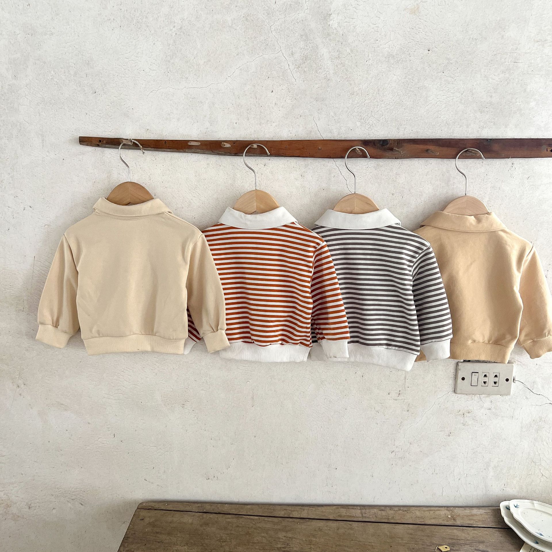 Estilo coreano ins suéter rayado del bebé neutral de los hombres flojos y niñas cuello POLO primavera superior