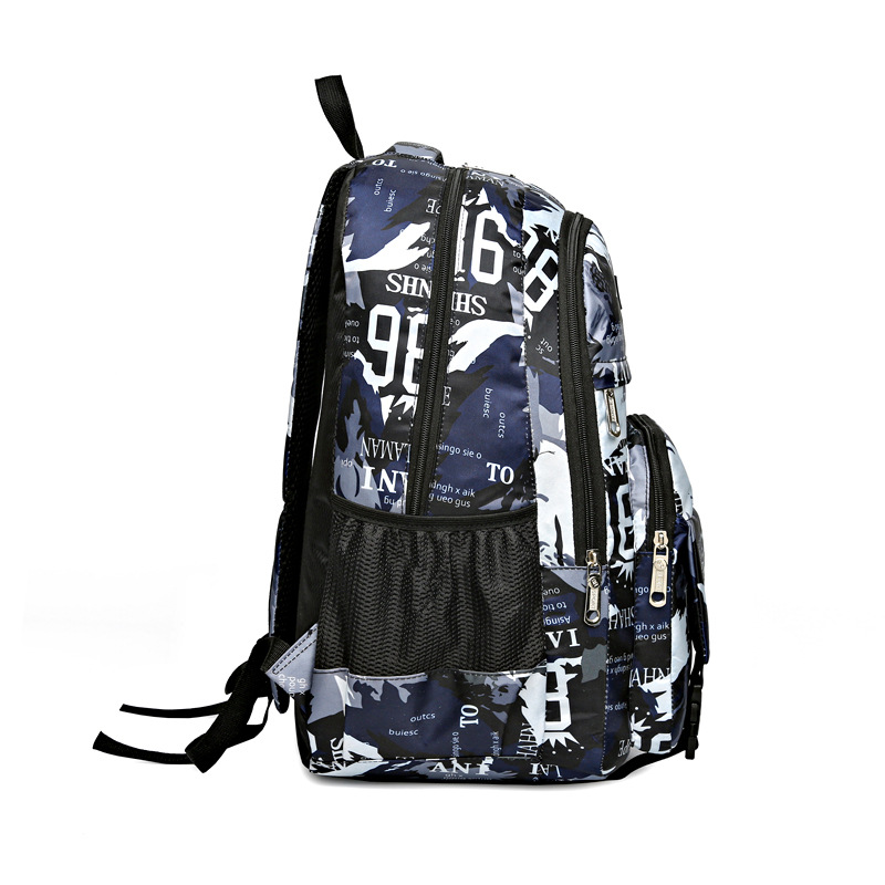 Mochila de moda informal para estudiantes nuevos y geniales transfronterizos Viajes al aire libre Viajes Oxford Camuflaje Mochila para computadora Tendencia