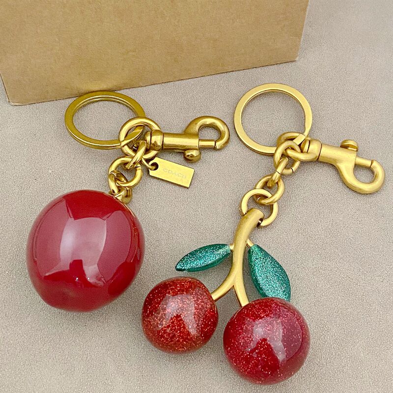 New fashion light luxury bag pendant keychain, creative cherry bag pendant, cherry metal pendant for women New fashion light luxury bag pendant keychain, creative cherry bag pendant, cherry metal pendant for women