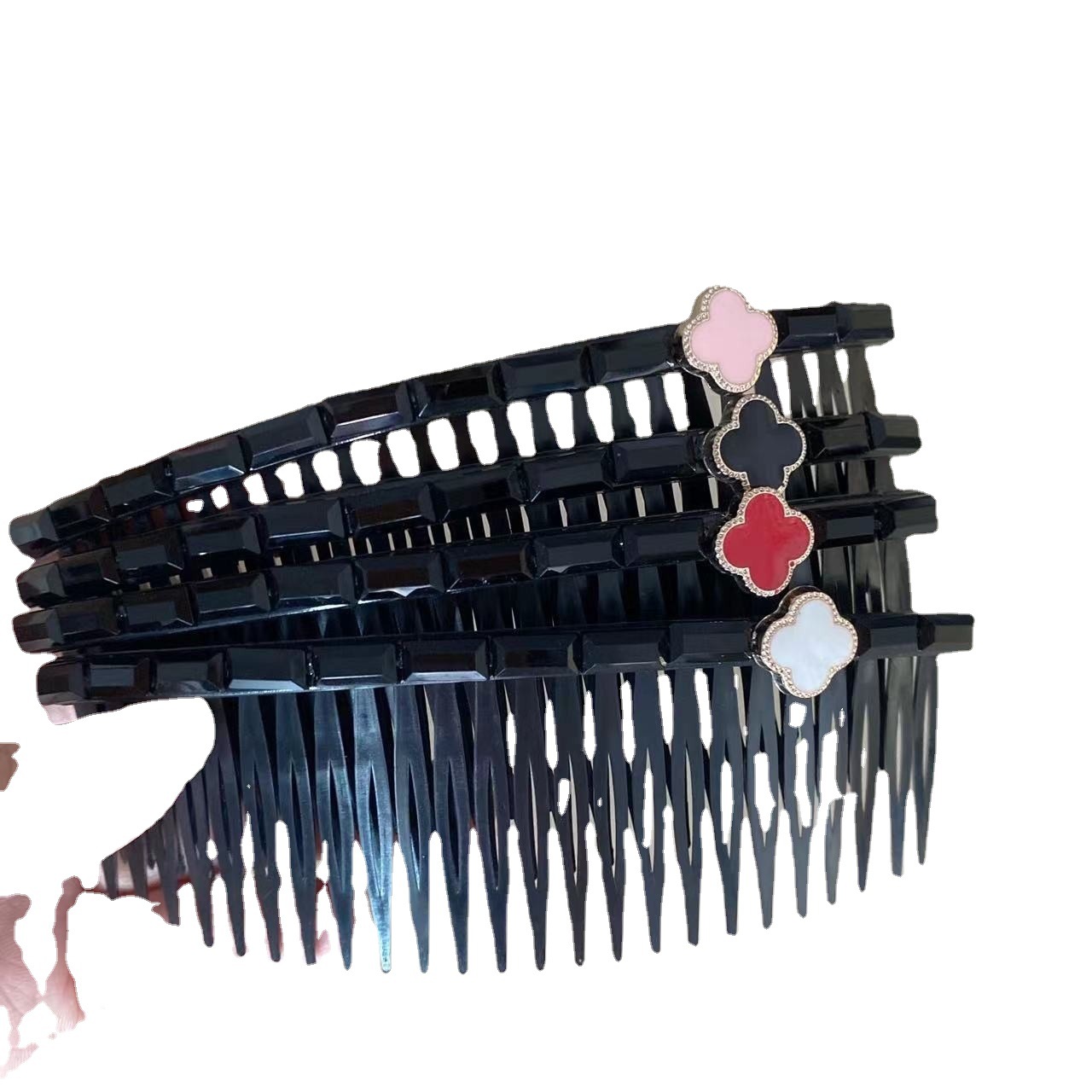 Peine de pelo de estilo coreano peine de inserción al por mayor simple Flor de cuatro pétalos flequillos roto artefacto trébol de cuatro hojas insertar peine clip lateral Cabeza trasera