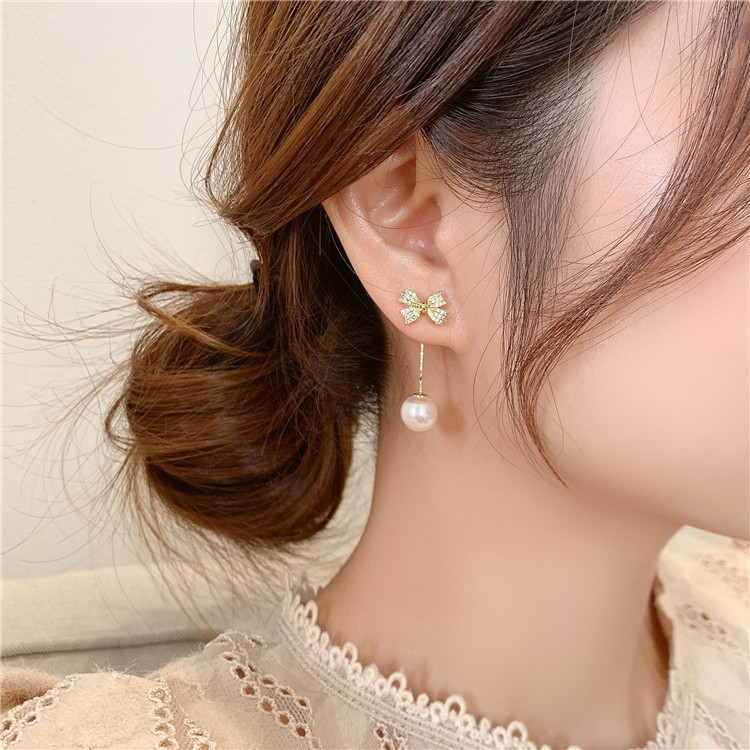 Fashion Bow Tassel Pearl Alloy Earrings display picture 5