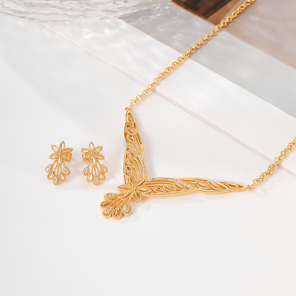 El estilo popular del Oriente Medio opciones transfronterizas de cobre y aluminio pendientes de piedra collar conjunto de joyas de mujer pernos de dos piezas conjunto de joyas