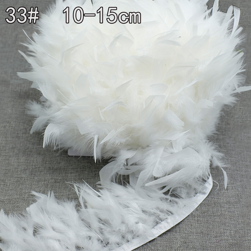 Colección de productos de plumas blancas al por mayor Accesorios de ropa de plumas hechos a mano de bricolaje Accesorios de plumas de ganso Material de plumas de pavo